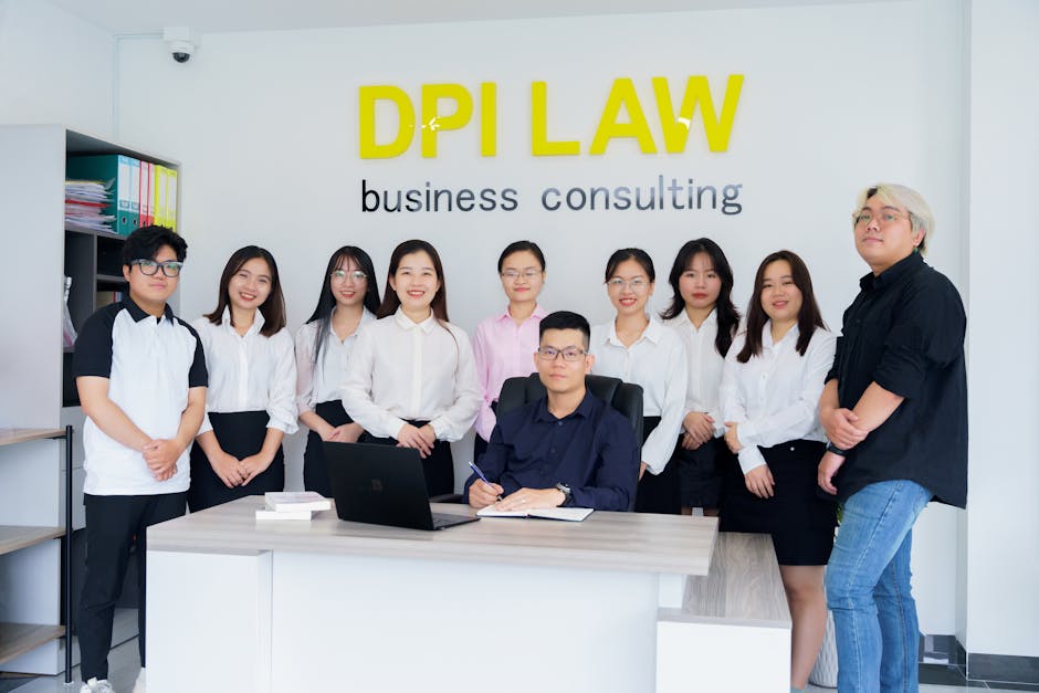 A diverse group of professionals in a business consulting office setting.